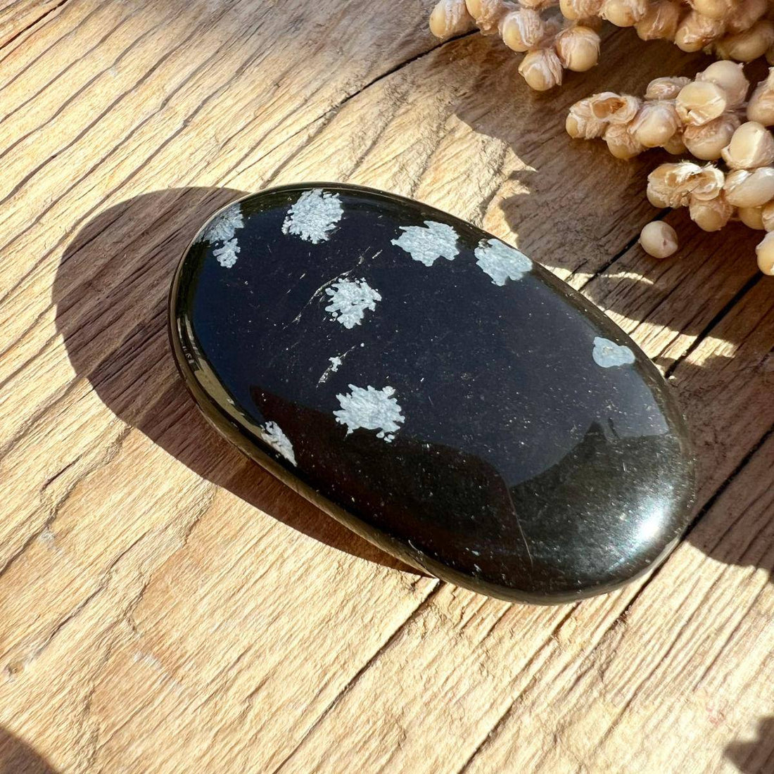 Schneeflockenobsidian Taschenstein